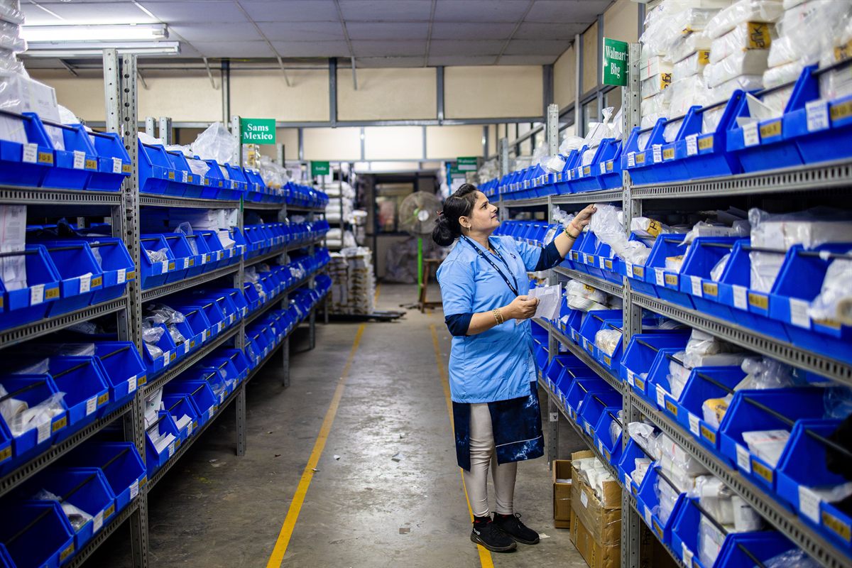 Stockroom inventory shelves organized with QR code labels